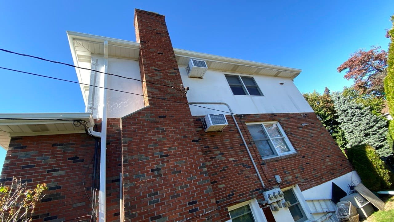 Gutter repair on brick home